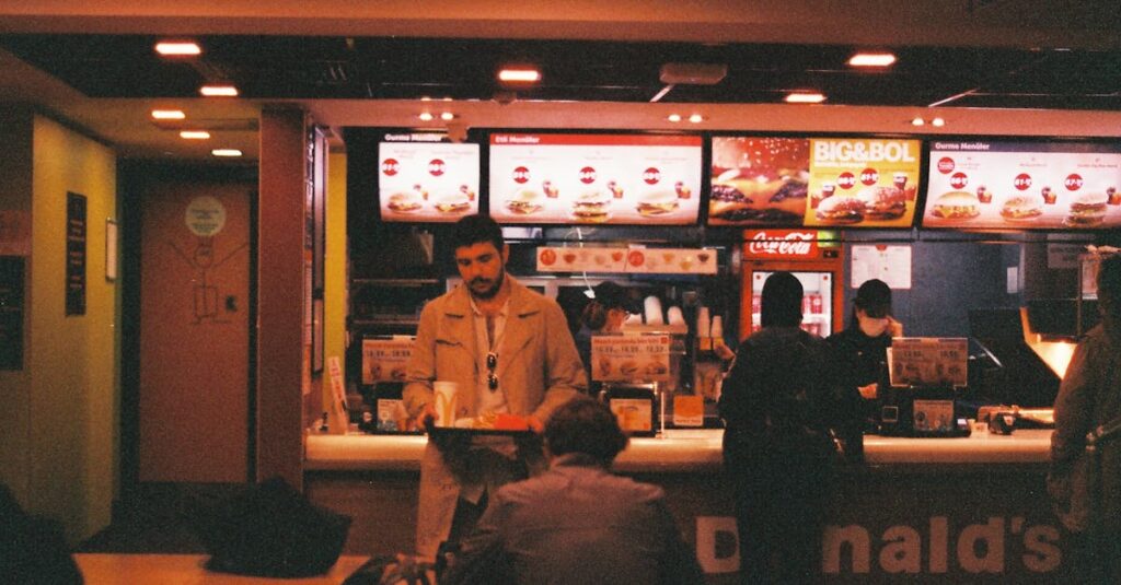 A retro-themed fast food restaurant scene with people ordering and dining inside.